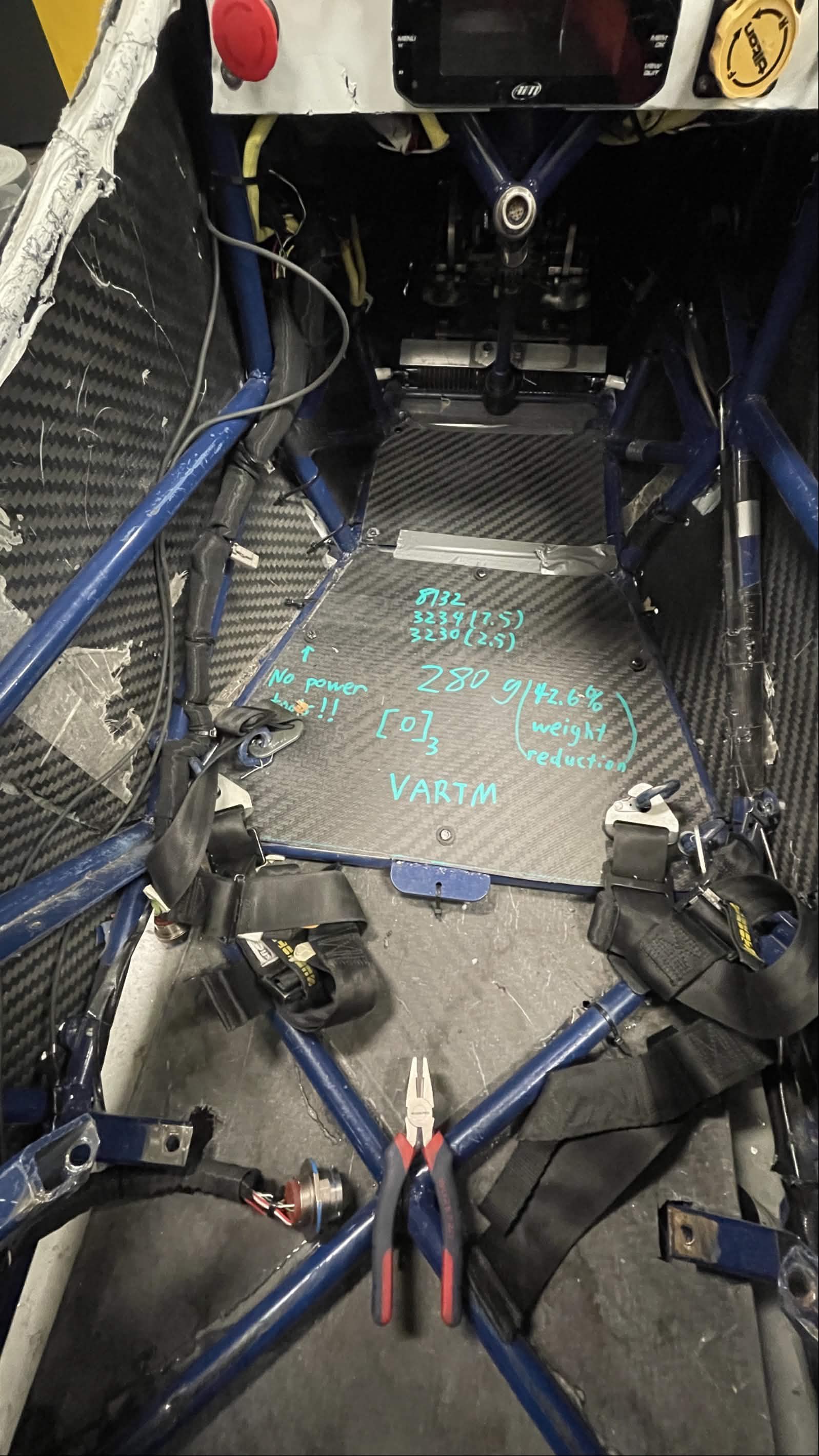 Carbon fiber chassis panel fitted inside the Nittany Motorsports vehicle